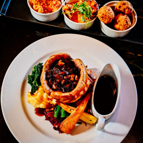 Vegetarian Sunday roast with Yorkshire pudding, seasonal vegetables and gravy at 1812 Lounge Bar Bournemouth